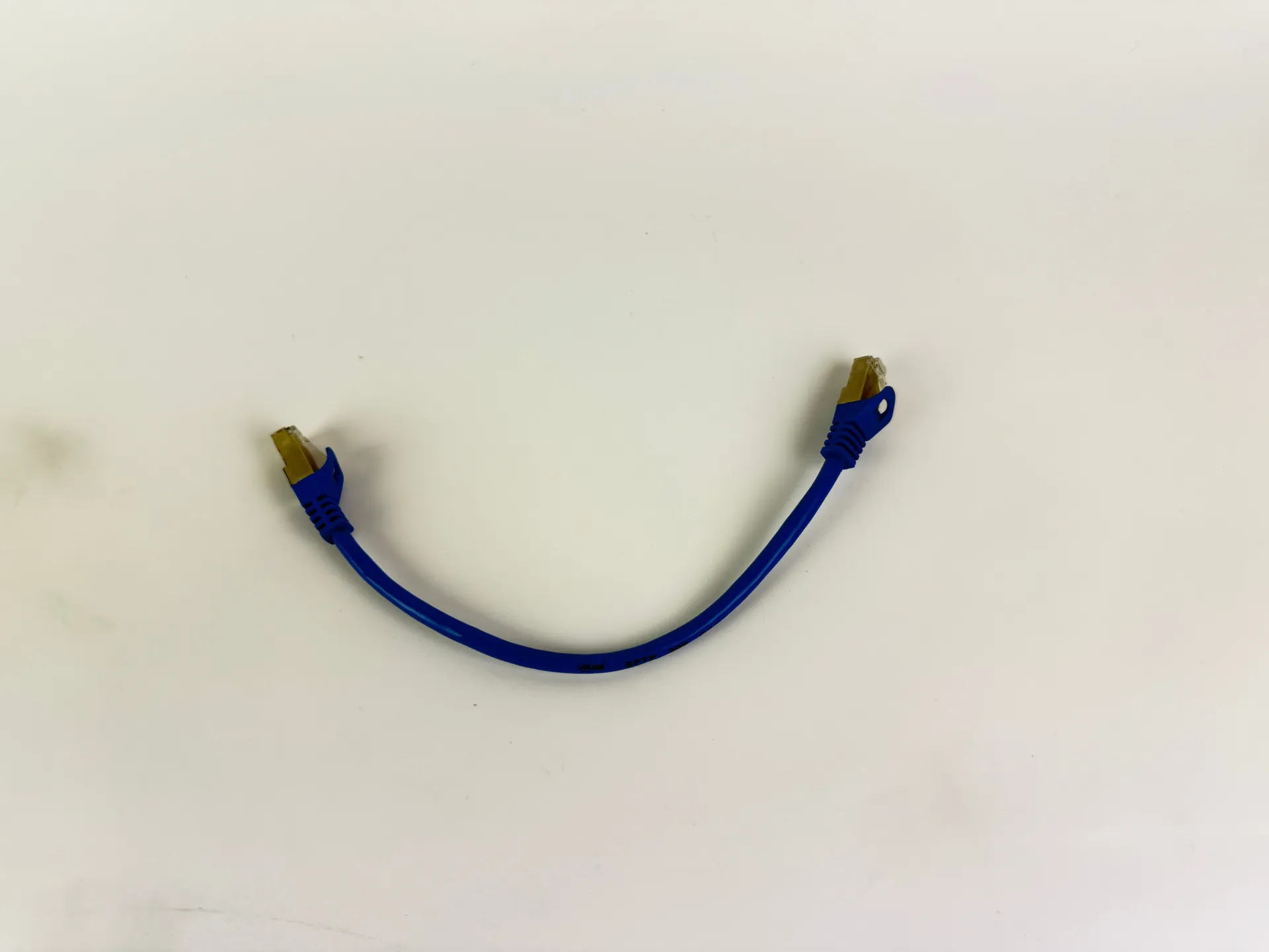 1x Inline CAT5e SFTP Ethernet Patch Cable 0.25m RJ45 Shielded 26AWG Blue 300MHz - Image 1