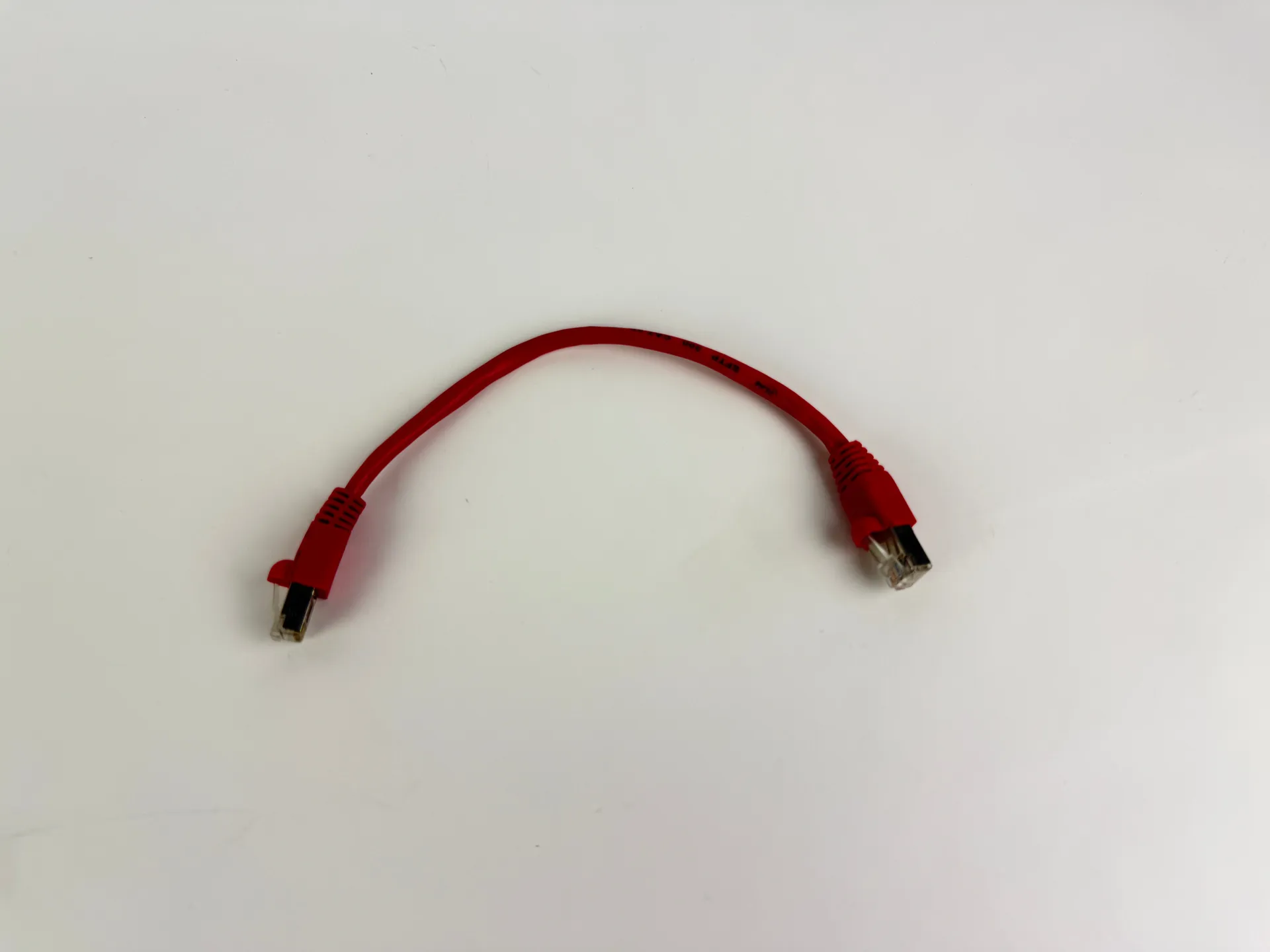1x Inline CAT5e SFTP Ethernet Patch Cable 0.25m RJ45 Shielded 26AWG Red 300MHz - Image 1